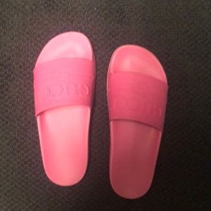 Pink gucci flip flops